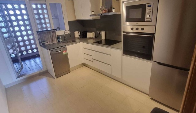 acogedor apartamento con vista al mar en Manilva