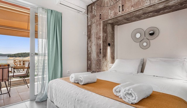 Apartment 'Mella Roa Amber' with Sea View, Wi-Fi and Air Conditioning