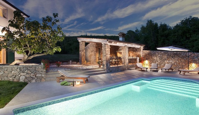 Attractive villa with private swimming pool, beach volleyball and fenced garden