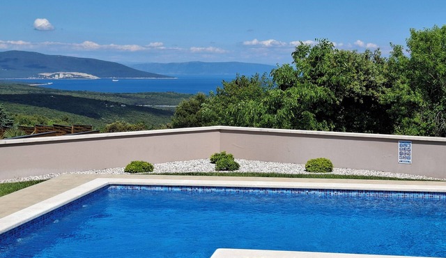 Attractive villa with stunning weiw on sea, pool and green landscape