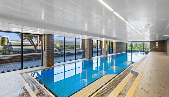 Chic 1-Bed with Balcony Views and Amenities