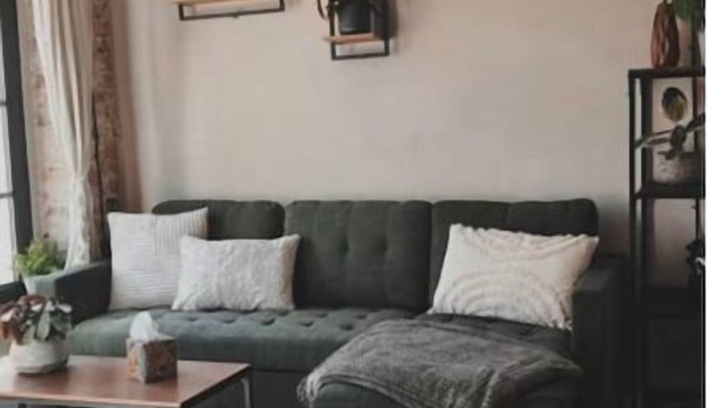 Comfortable apartment near the water with its own bar.