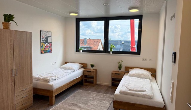 Deluxe 5-Bedroom Apartment with Modern Kitchen and Two Bathrooms