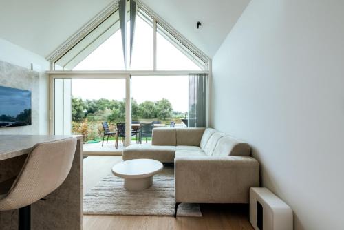 Domein Mase - Luxe vakantiewoningen aan de Maas in Maaseik