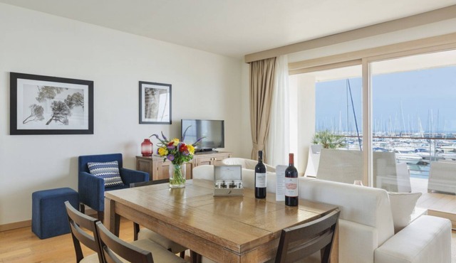 Elegant and spacious three-room apartment characterized by an elegant and refined design of approximately 75 m2 consisting of a living room with double sofa bed and fully equipped induction kitchen which leads to a large terrace furnished with table and