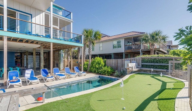 Exquisite Oceanfront Oasis: Immerse in Luxury with Pool & Putting Green at this