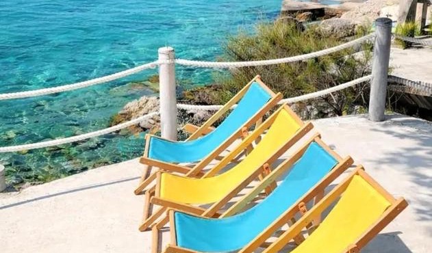 Family home away on the beach, free parking