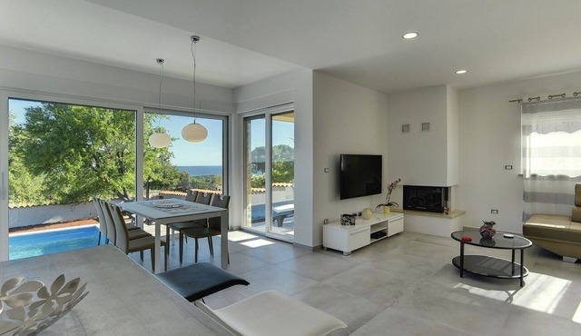Fantastic new villa with private pool, air conditioning, wifi of a sauna and beautiful sea view