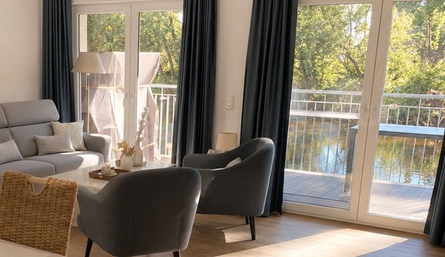First floor dream apartment with private sauna right on the water.