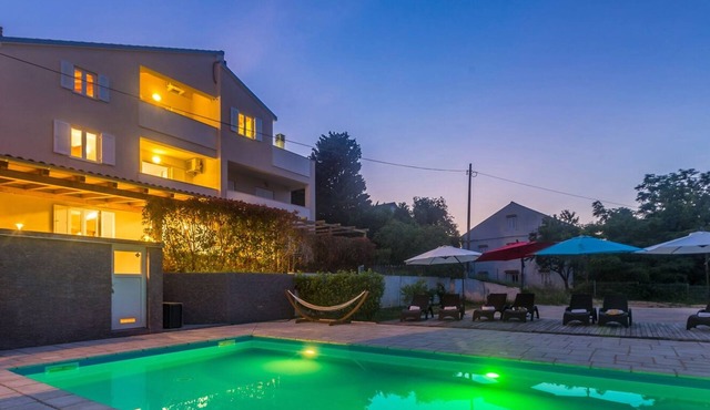 Holiday apartment NAYA with large heated pool (50m2) in Nerezine, beautiful beach with crystal-clear sea