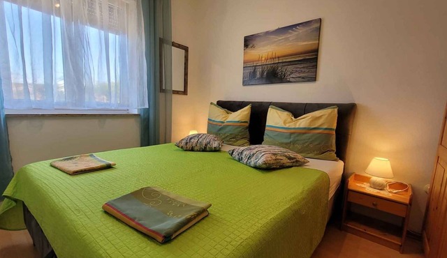 Holiday apartment with balcony and one bedroom