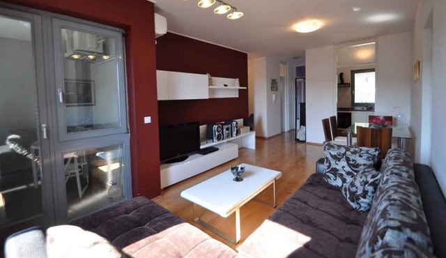 Holiday apartment with air conditioning and balcony