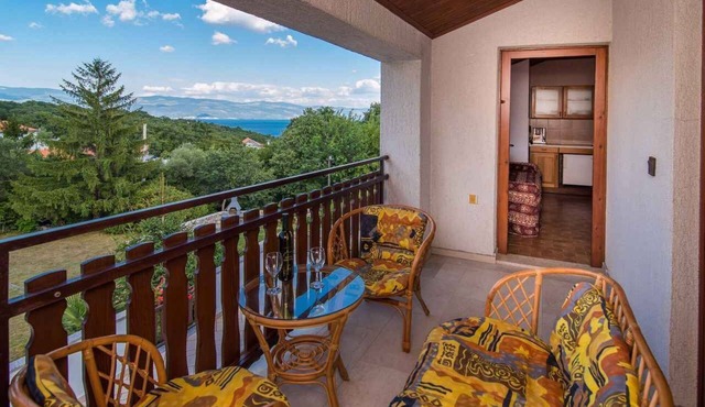 Holiday apartment with balcony and air conditioning