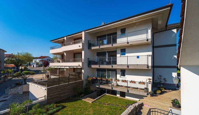 Holiday apartment with balcony and sea view
