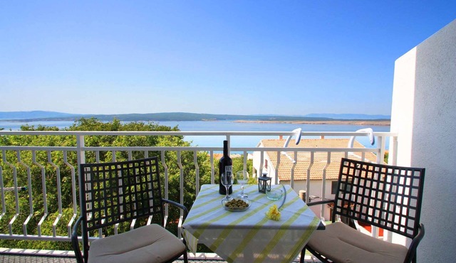 Holiday apartment with balcony and air conditioning