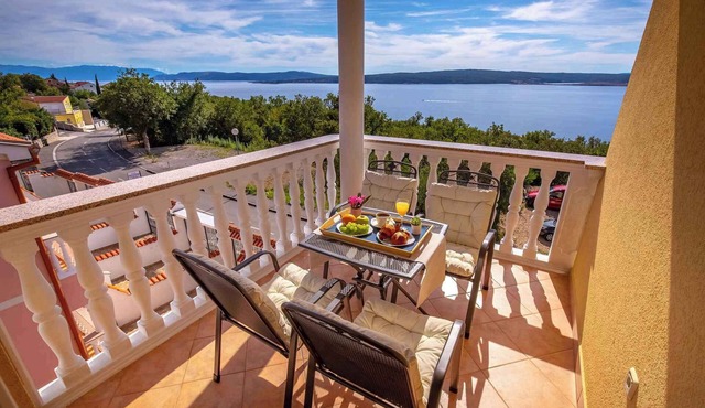 Holiday apartment with balcony and sea view