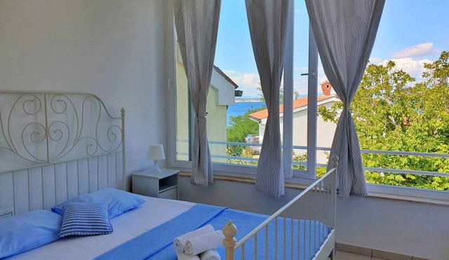 Holiday flat with air conditioning and barbecue facilities