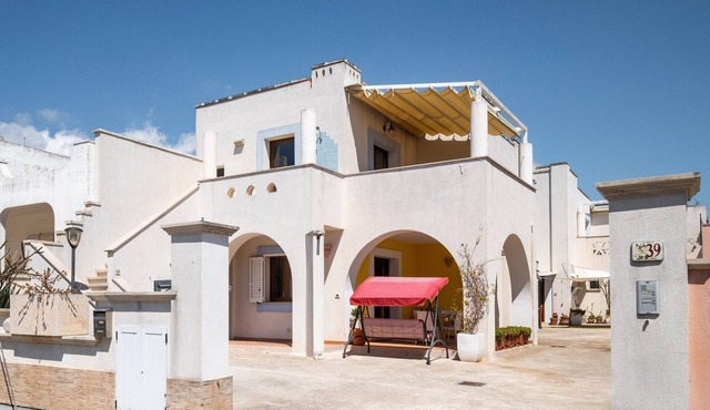 Holiday Home 'Sacara - Piano Terra - La Plumeria' with Private Terrace, Balcony and Air Conditioning