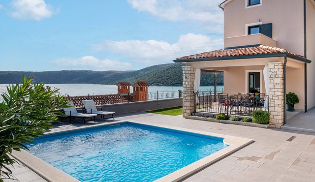 Holiday home near the sea with a stunning view