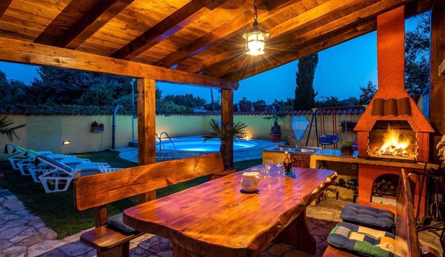 Holiday home with pool, barbecue terrace and children's swing