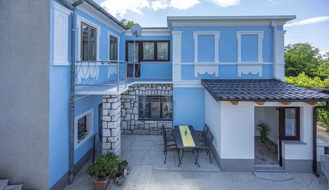 Holiday home with large terrace and air conditioning