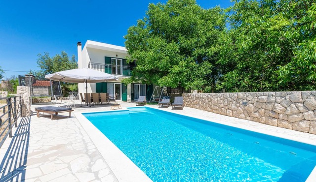 In Srijane in the Dalmatian hinterland is located this semi-detached house, which is spread over two