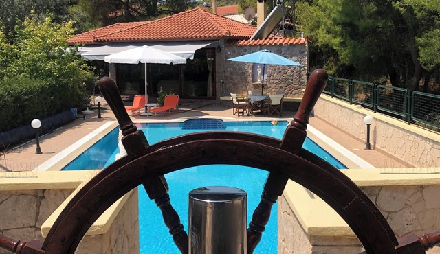 It is a stone property of 75.22 sq.m. with a wooden roof. Swimming Pool & B.Q.