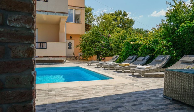 JURIĆ apartments with outdoor pool and bargain in RAB-PALIT