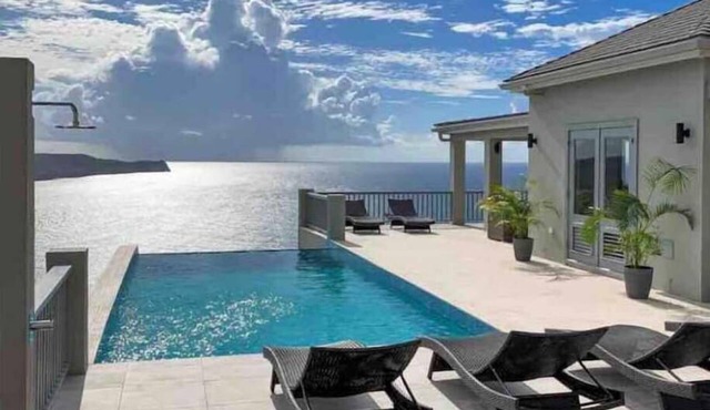 Luxury and tranquility in a 5 suite villa with 280 degree ocean views