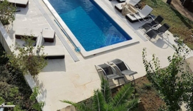 Luxury villa with private heated pool and sea view 4