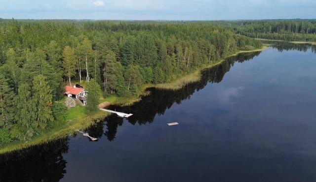 Modern house with private lake and sauna