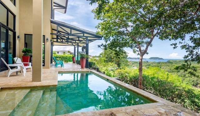 Nostalgic Retro Home on Luxurious Lot with a Private Infinity Pool and Ocean Views