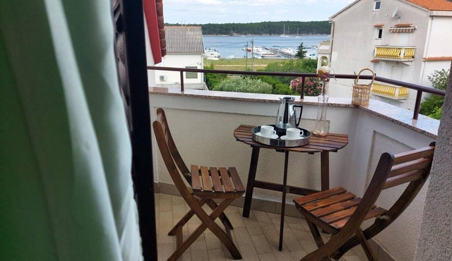 One bedroom apartment with terrace and sea view Palit, Rab (A-15794-b)
