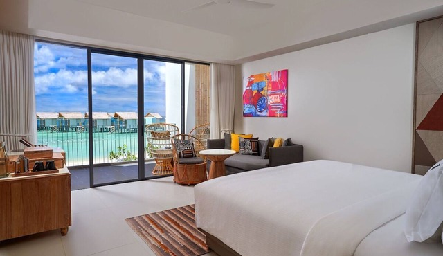 Overwater Studio with Balcony & Rock-Inspired Style