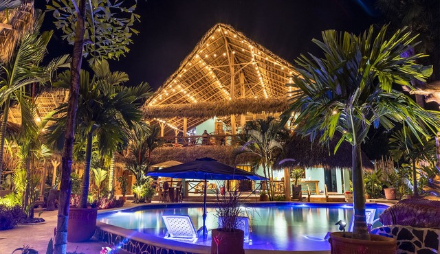 Private beach house paradise w/private pool bar and game area.