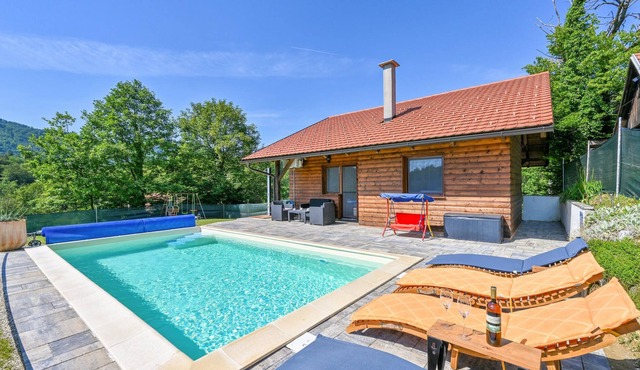 This vacation home with pool is located on a hill with a beautiful view of the countryside, which wi