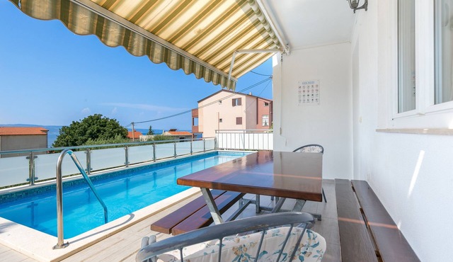 Two bedroom apartment with a swimming pool Mali Rat, Omiš (A-9698-a)