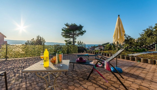 Two bedroom apartment with a swimming pool Stanići, Omiš (A-18676-a)