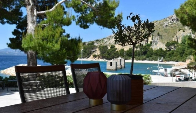 Two bedroom apartment with a swimming pool by the beach Medići, Omiš (A-25214-e)