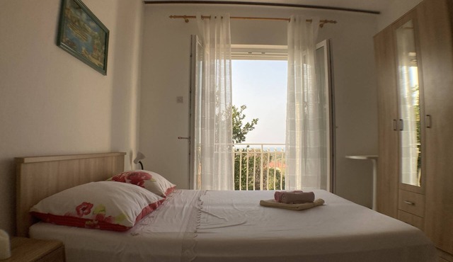 Two bedroom apartment with terrace and sea view Lun, Pag (A-9395-b)