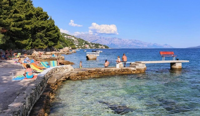 Two bedroom apartment with balcony and sea view Stanići, Omiš (A-10350-a)