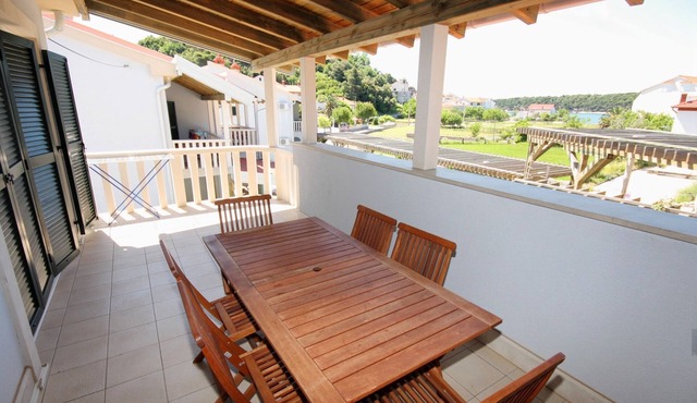 Two bedroom apartment with a swimming pool Palit, Rab (A-3212-c)