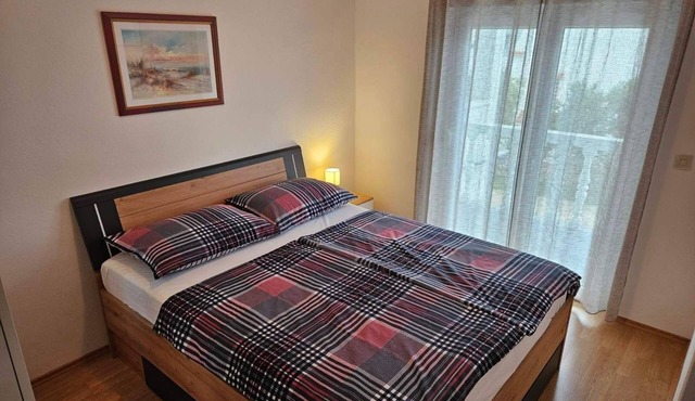 Two bedroom apartment with a swimming pool Barbat, Rab (A-4951-c)