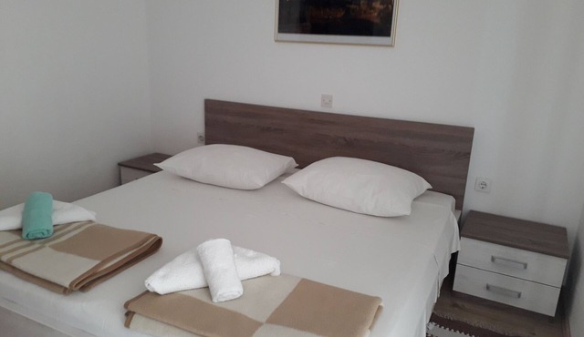 Two bedroom apartment with terrace and sea view Barbat, Rab (A-5070-b)
