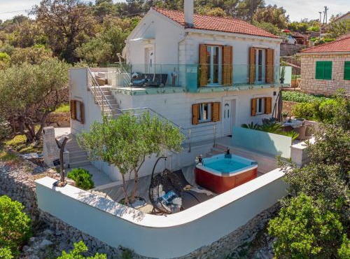Uniquely designed Villa Ivana with outdoor Jacuzzi nearby the pebble Banje beach at the Island of Solta