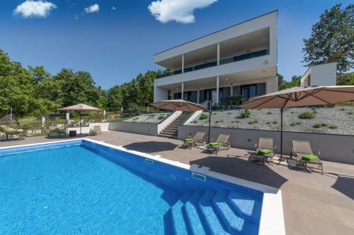 Villa Althea for 8 persons near Labin with 35 m2 heated pool, kids playground & large garden
