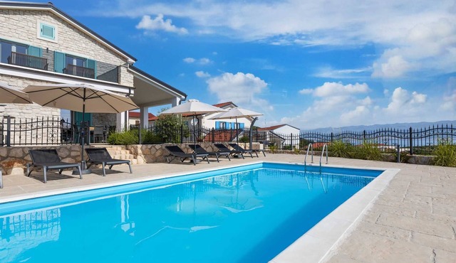 Villa Andreja – Stylish Oasis with Heated Pool & Sea View