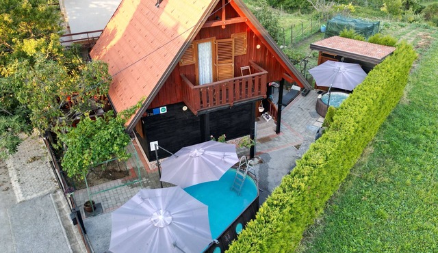 Wooden house in Zagorje with jacuzzi, sauna, pool, barbecue, and scenic views