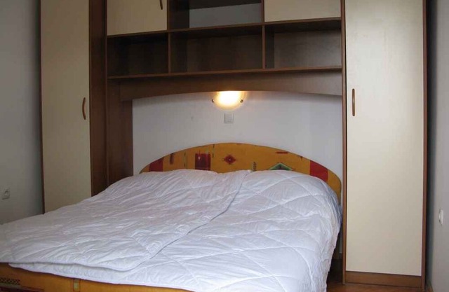 Holiday apartment with balcony and air conditioning