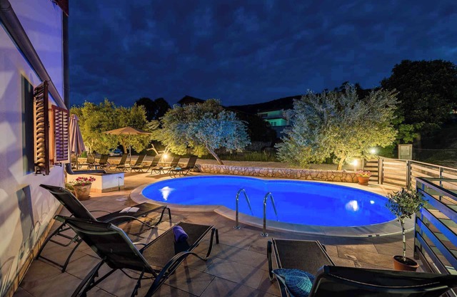 Holiday flat with swimming pool, hot tub and sauna